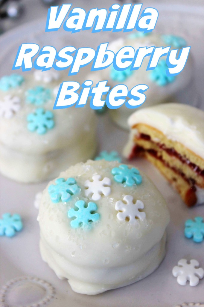 Vanilla Raspberry Bites are a delicious dessert featuring cookies, raspberry jam and white chocolate. Decorate with sprinkles for a seasonal look!