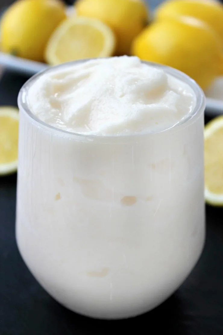 This Copycat Chick-Fil-A Frosted Lemonade Recipe will having you thinking it;s the real thing. Tart. creamy and cool this is the perfect summer drink!