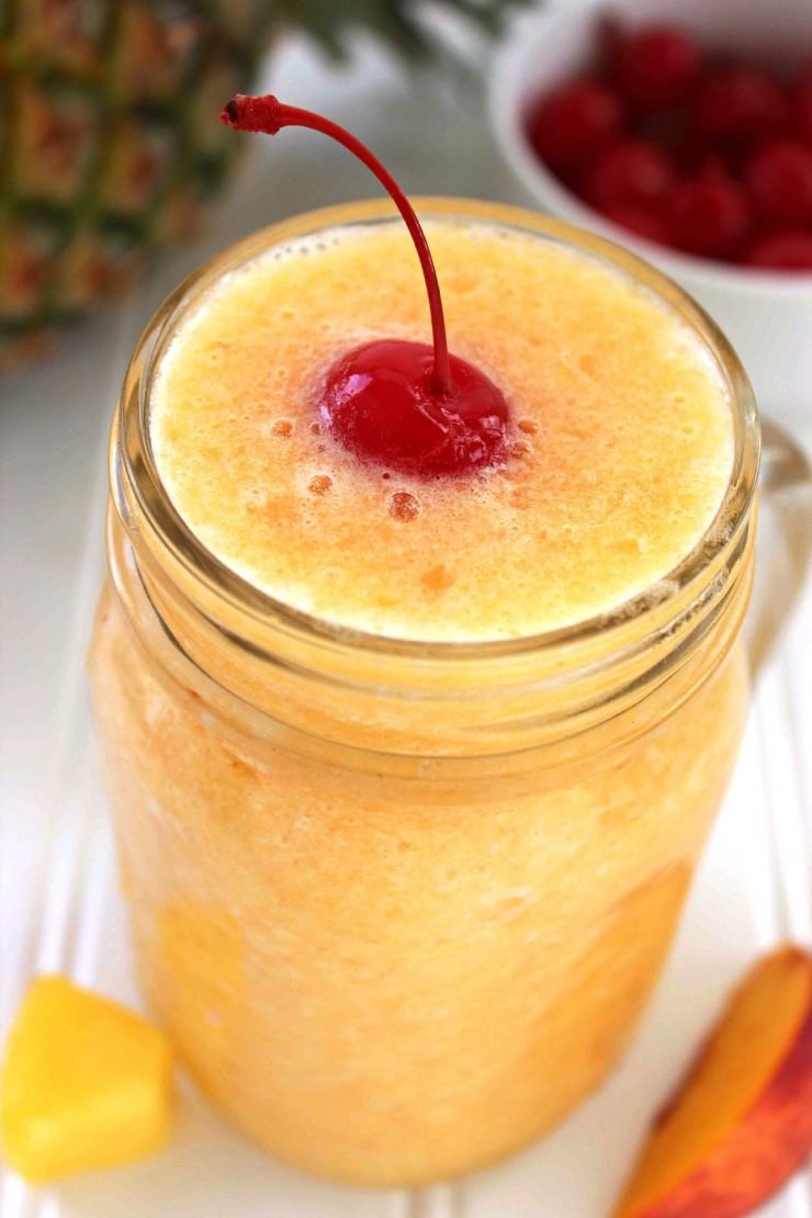 With summer on the way, these Peach & Pineapple Tropical Slushies are the perfect drink to help you cool down.
