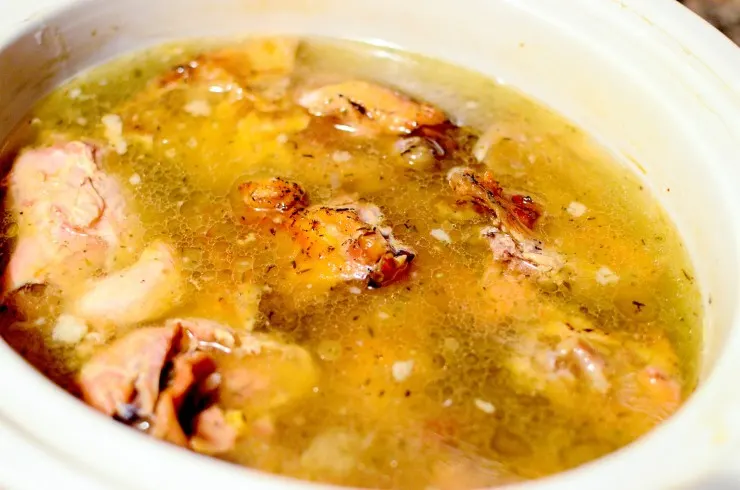 Stretch your food dollar with this Slow Cooker Turkey Soup recipe - a delicious and nourishing easy to make slow cooked soup.