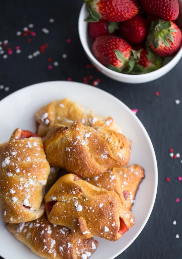 These strawberry rolls are an easy breakfast treat that can easily be dessert and made quickly enough to satisfy any sweet tooth!
