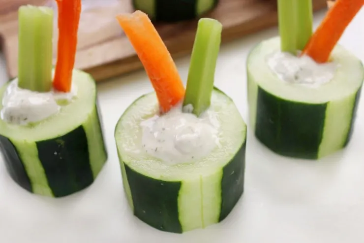 These Cucumber Bites are a fresh appetizer perfect for serving at parties. It's a fun twist on veggies and dip that everyone will love.