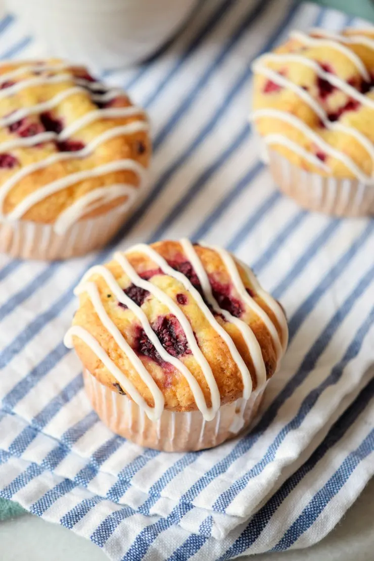 These Raspberry Orange Muffins are a luscious breakfast option with a hint of sweet orange flavour balanced by the tartness of raspberries. It's the perfect way to start your morning!