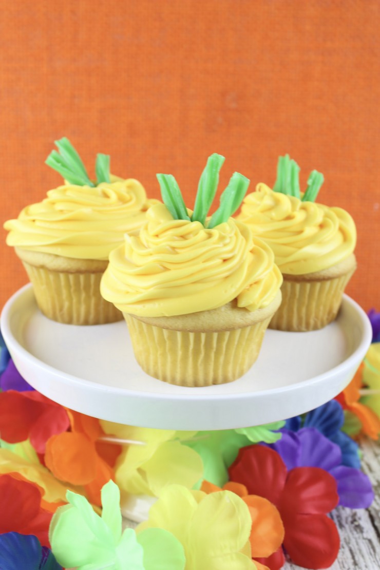 These Pineapple Cupcakes are super adorable, don't you think? Perfect for any summer or Hawaiian themed party, everyone are sure to love these cute desserts.