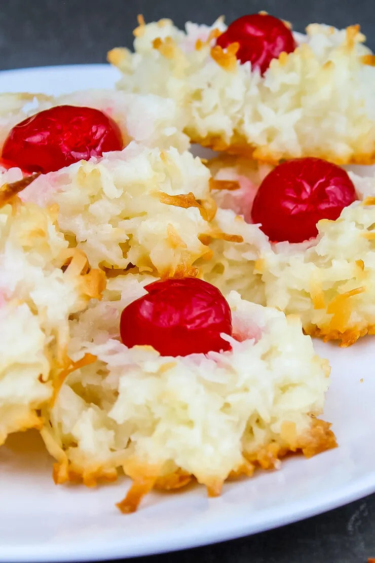Cherry Macaroons are one of my all time favourite Christmas cookies. Classic coconut macaroons are topped off with a cherry for real old-world charm.