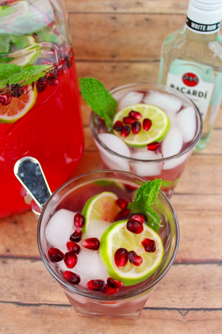 This Pomegranate Mojito is a festive winter cocktail perfect for serving at holiday parties.  It is delicious and sure to be a hit at your New Years eve bash or for pre-Christmas dinner drinks. 