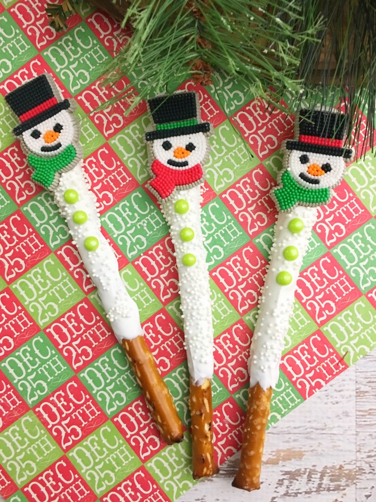 These snowmen pretzel rods are a fun and festive holiday treat. These sweet and salty snacks are great for Christmas parties and super easy to make. A sure way to impress guests!