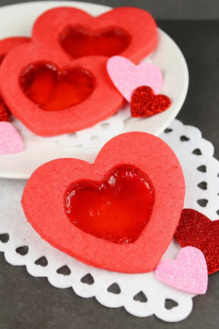 These Stained Glass Heart Cookies are a fun Valentine's day cookie that are as easy to make as they are fun to eat. These cookies are an adorable heart-shaped treat!