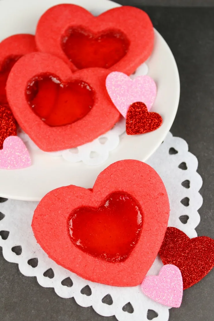 These Stained Glass Heart Cookies are a fun Valentine's day cookie that are as easy to make as they are fun to eat. These cookies are an adorable heart-shaped treat!