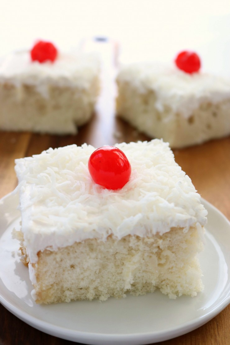 This Coconut Poke Cake is a delicious dessert to enjoy after dinner with a mug of coffee but it works equally as well for serving guests.