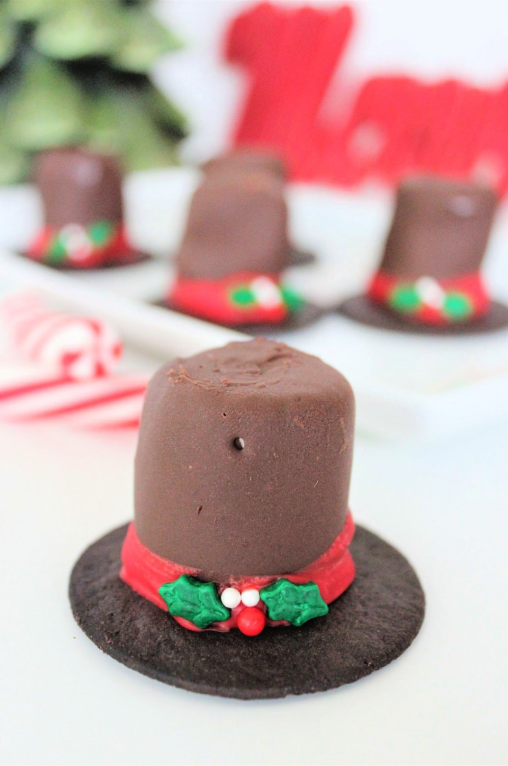These Marshmallow Frosty Hats are a tasty, seasonal treat that can be eaten alone or serve as adorable cupcake toppers!