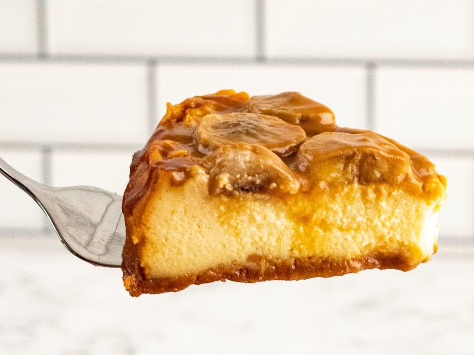 This Bananas Foster Cheesecake is made with a vanilla wafer crust that is then filled with a rum spiked banana cheesecake filling with a gooey bananas foster topping.