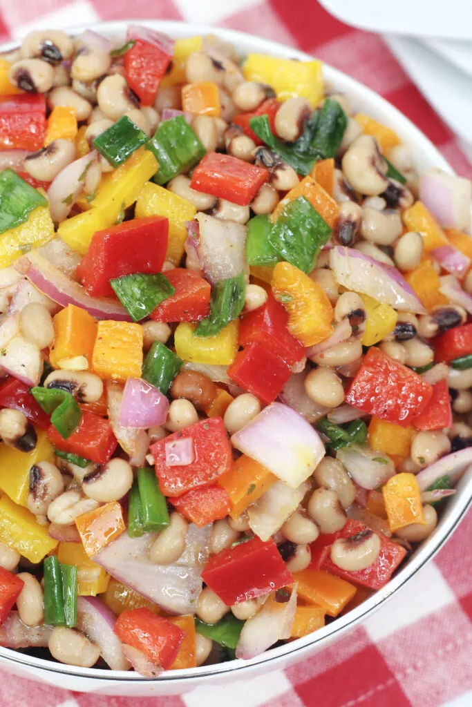 Quick and easy to make, serve this Black Eyed Peas Bean Salad as a side or enjoy it as a salsa with tortilla chips!