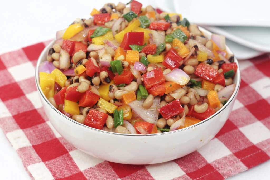 Quick and easy to make, serve this Black Eyed Peas Bean Salad as a side or enjoy it as a salsa with tortilla chips!