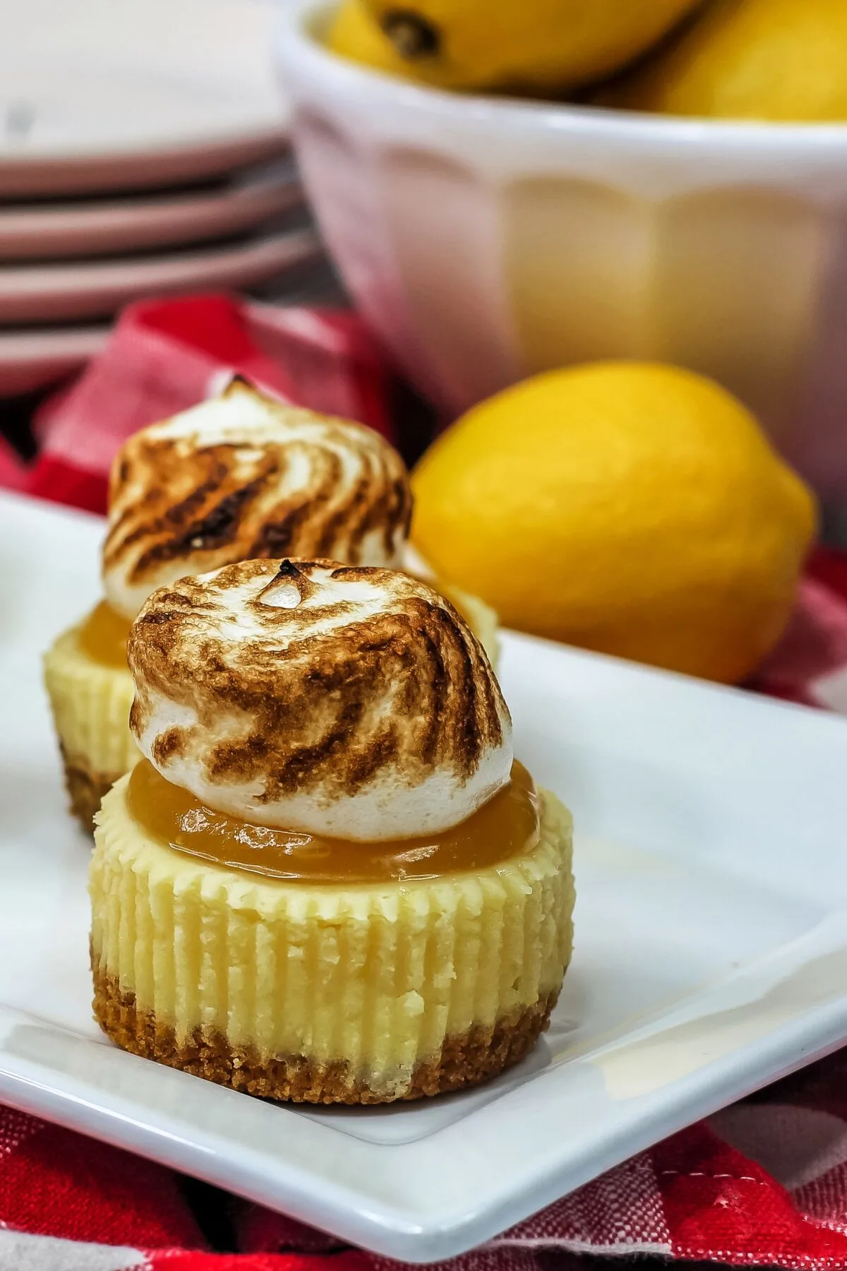 These mini lemon meringue cheesecakes are small, but they pack a tangy punch. A delicious and easy to make dessert for any occasion.