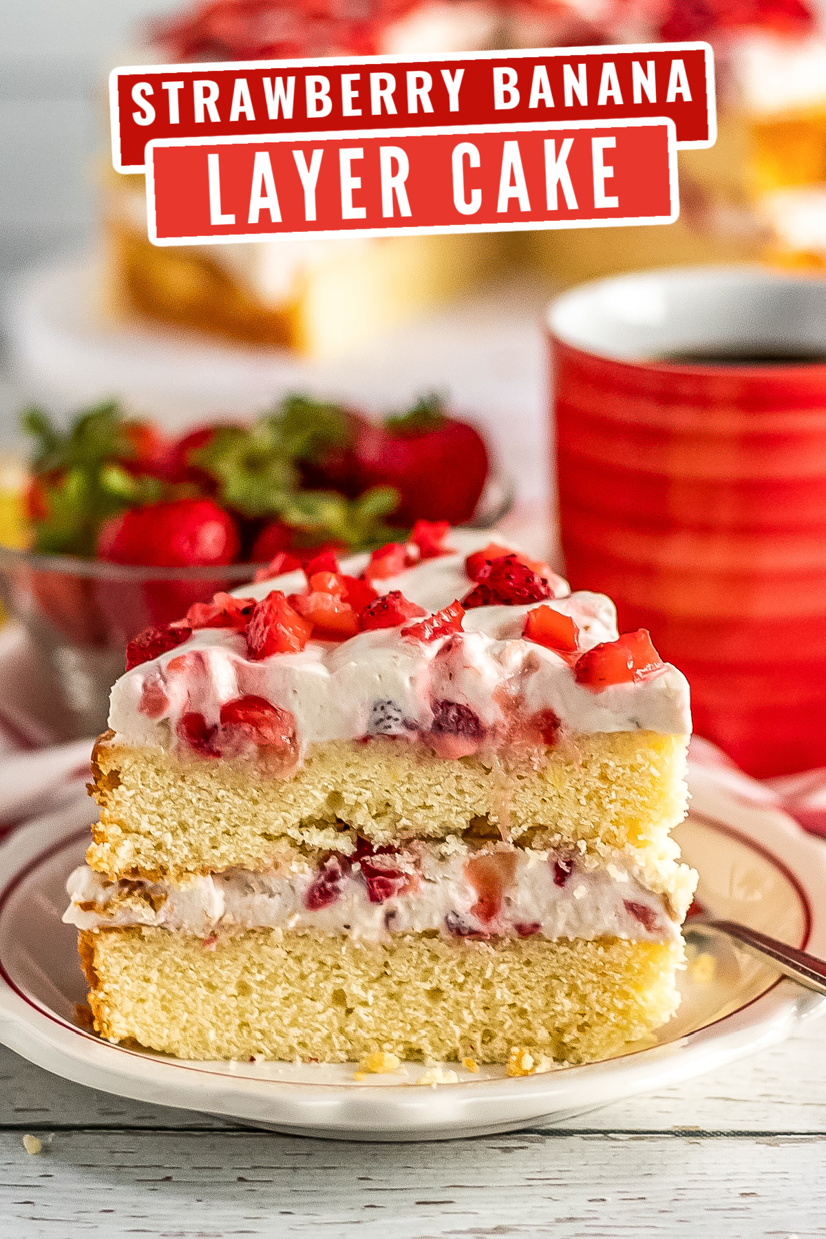 An, easy recipe for a strawberry banana layer cake with layers of creamy whipped cream frosting made with fresh bananas and strawberries.