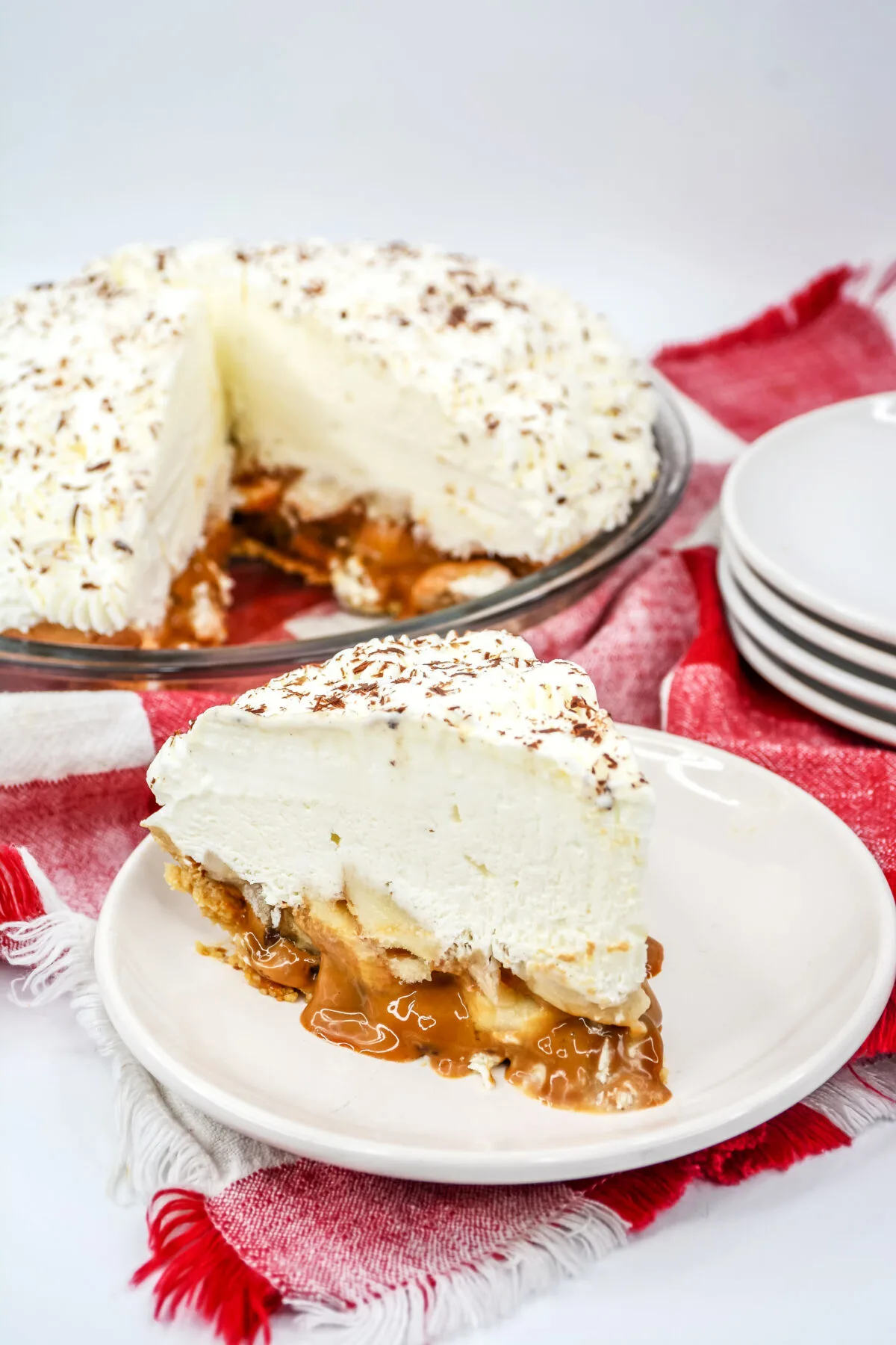 A classic English dessert, this banoffee pie recipe is easy to make and combines the taste of toffee, bananas, and cream into a tasty treat.