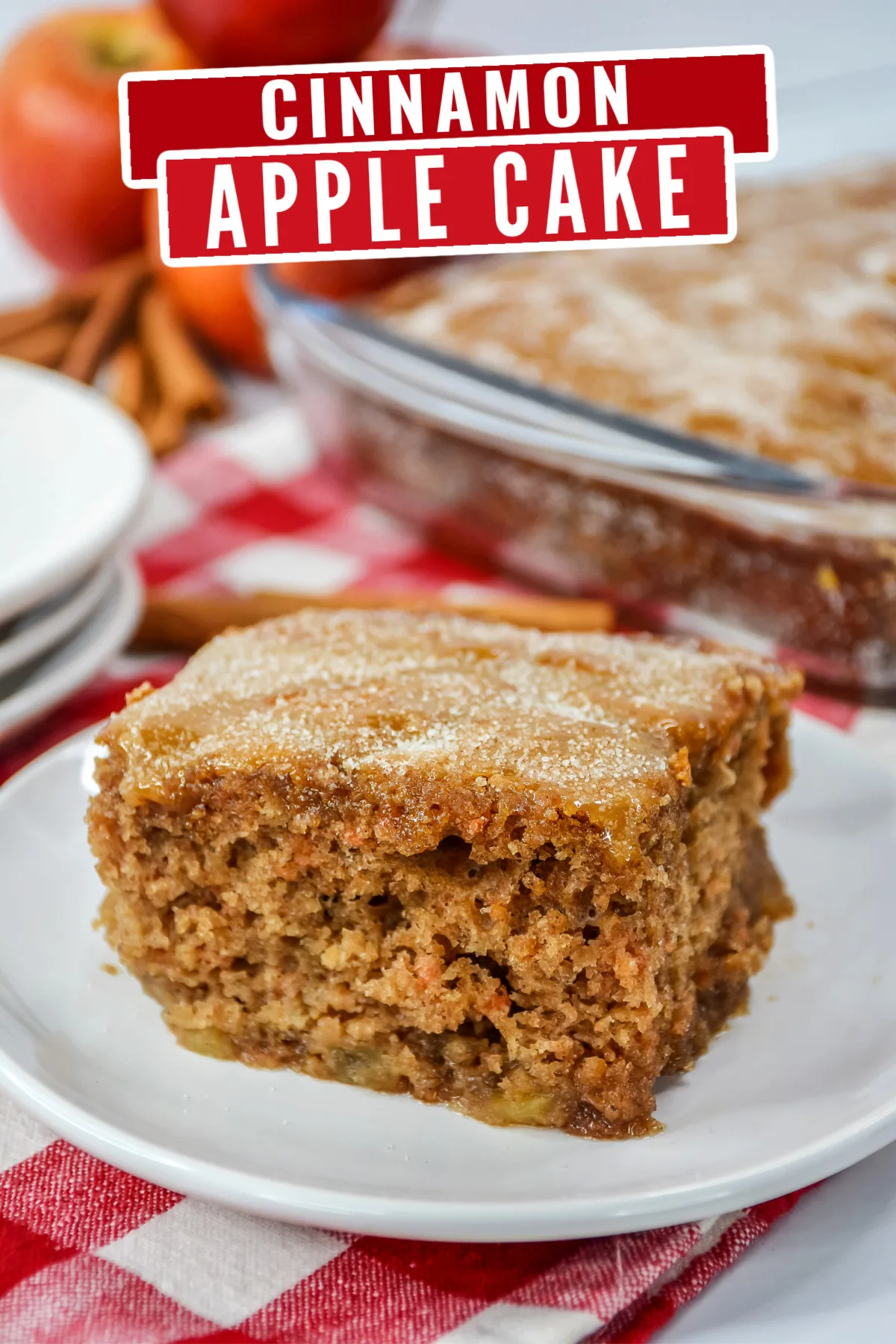 This cinnamon apple cake recipe is sure to become a family favorite! It's loaded with apples and topped off with a sweet sugar crust.