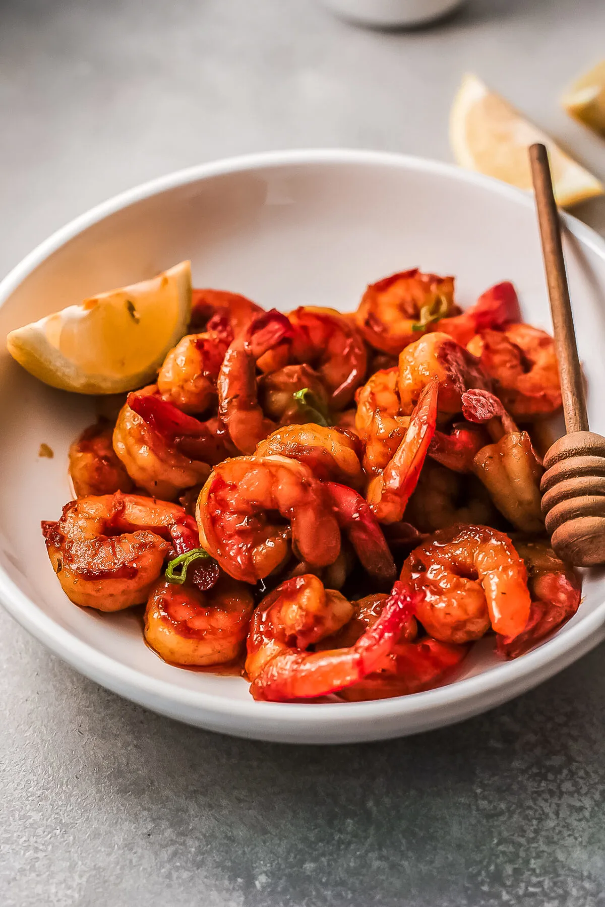 Amazingly flavorful and tender Honey Cajun Shrimp featuring a sweet & spicy sauce. This recipe is so easy to make you won't believe it.