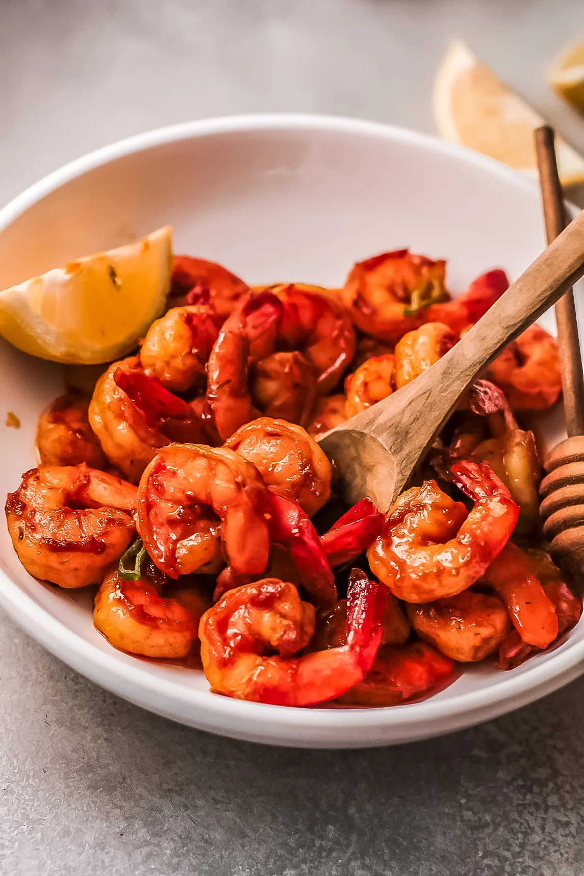 Amazingly flavorful and tender Honey Cajun Shrimp featuring a sweet & spicy sauce. This recipe is so easy to make you won't believe it.