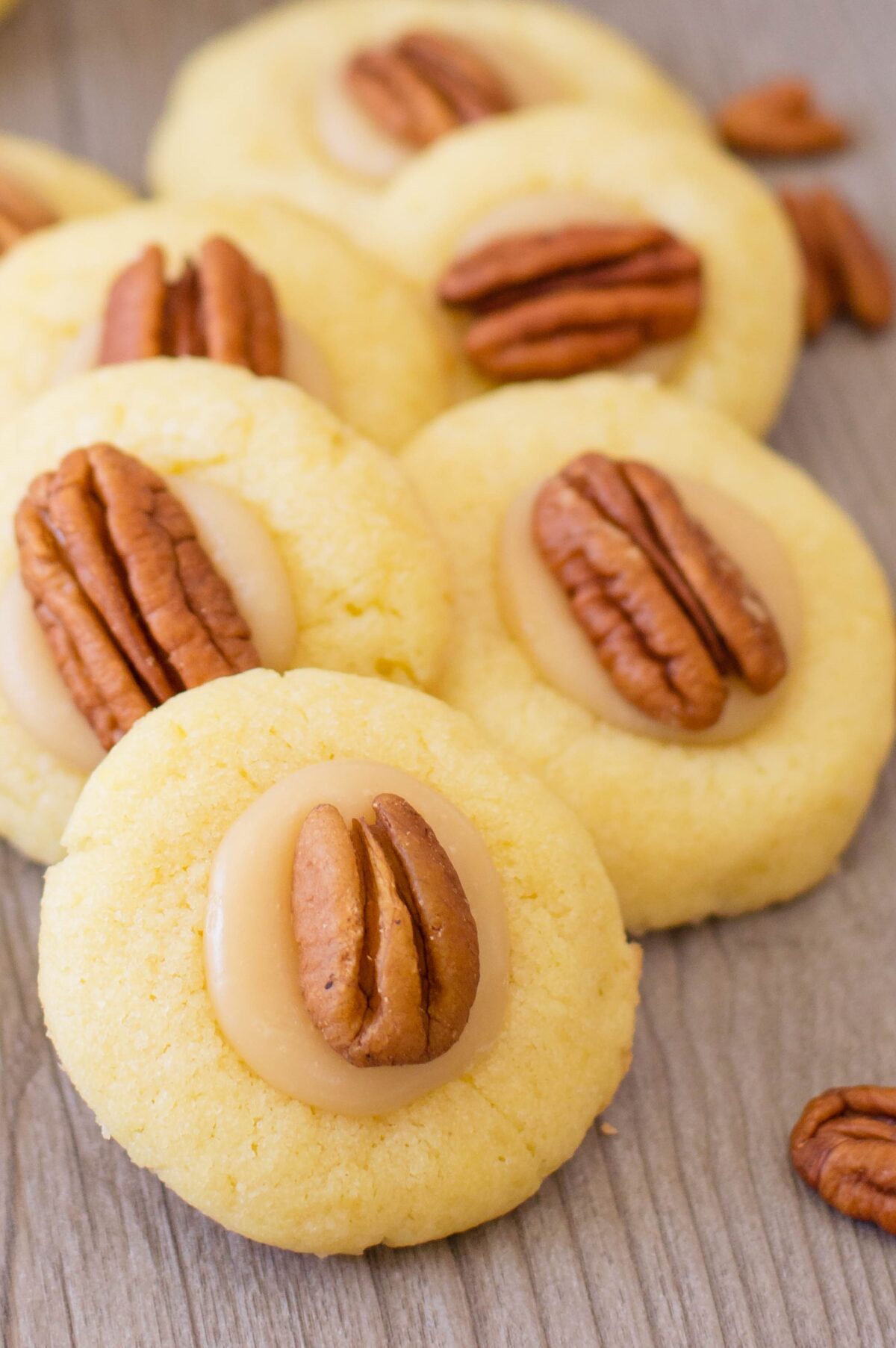 These pecan thumbprint cookies are easy to make and taste wonderful! They're perfect for holiday parties - or any day of the year, really.