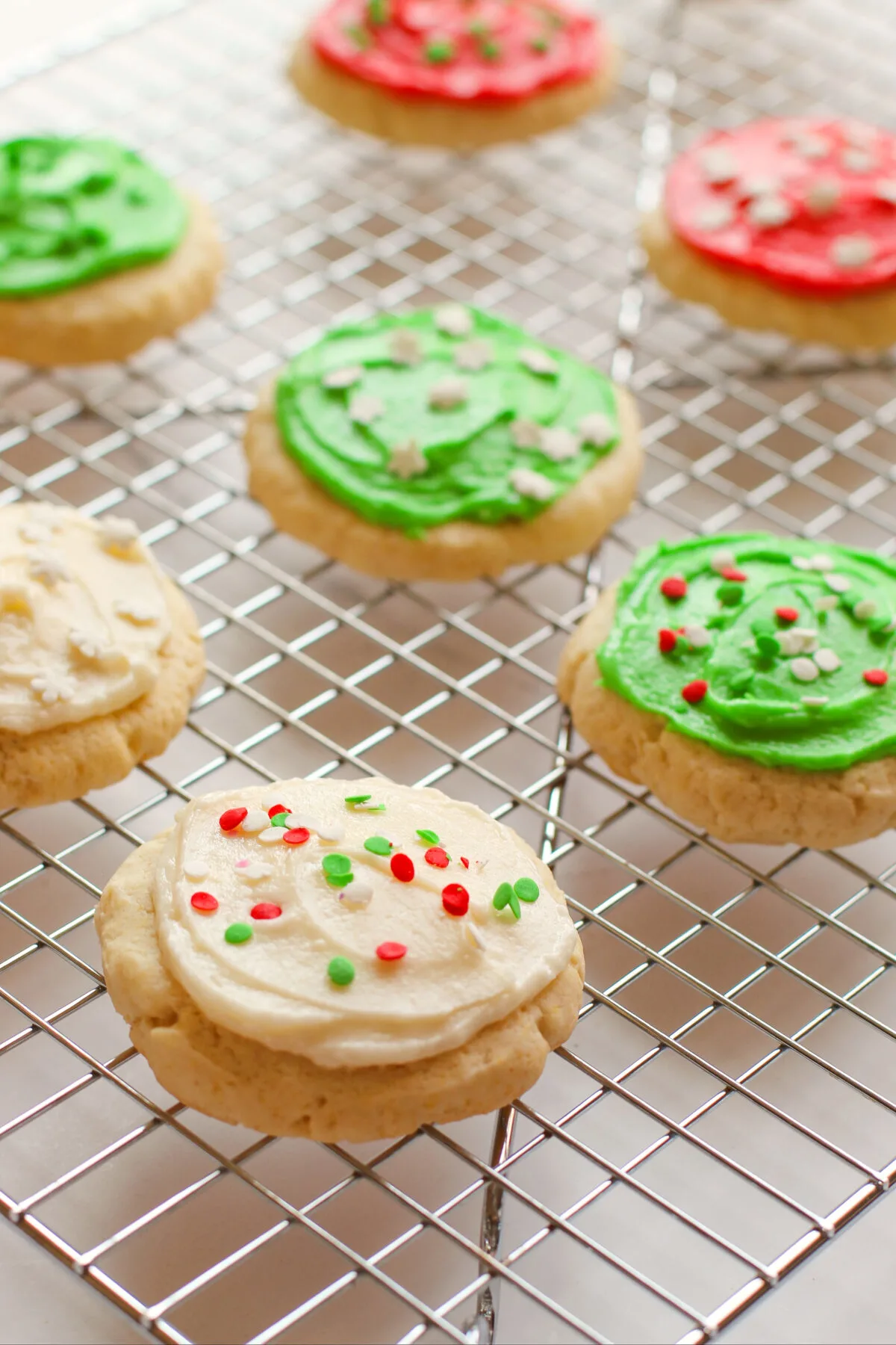 My copycat recipe for the famous Lofthouse frosted sugar cookies. These soft and cakey cookies are a must have around Christmas time!
