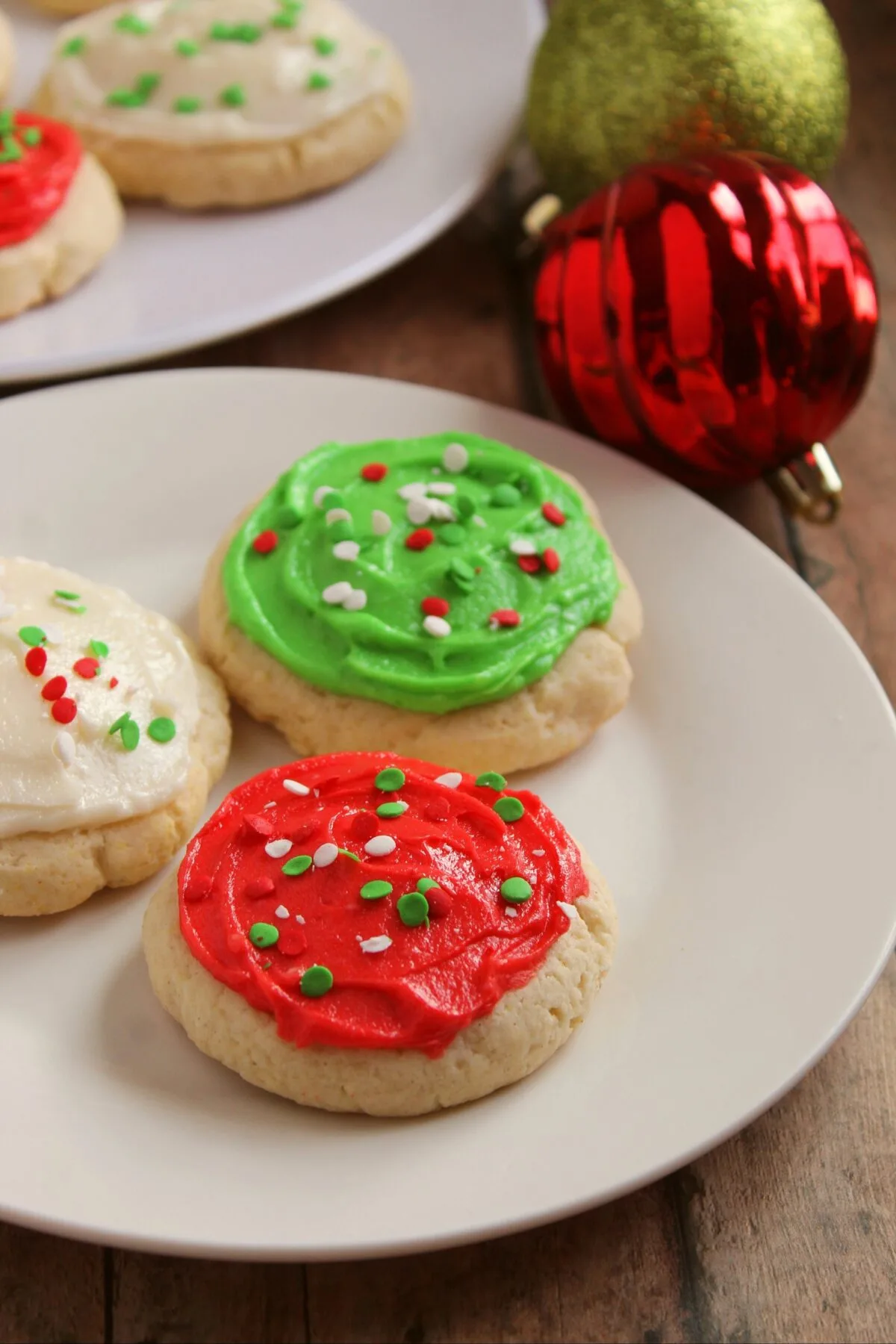 My copycat recipe for the famous Lofthouse frosted sugar cookies. These soft and cakey cookies are a must have around Christmas time!