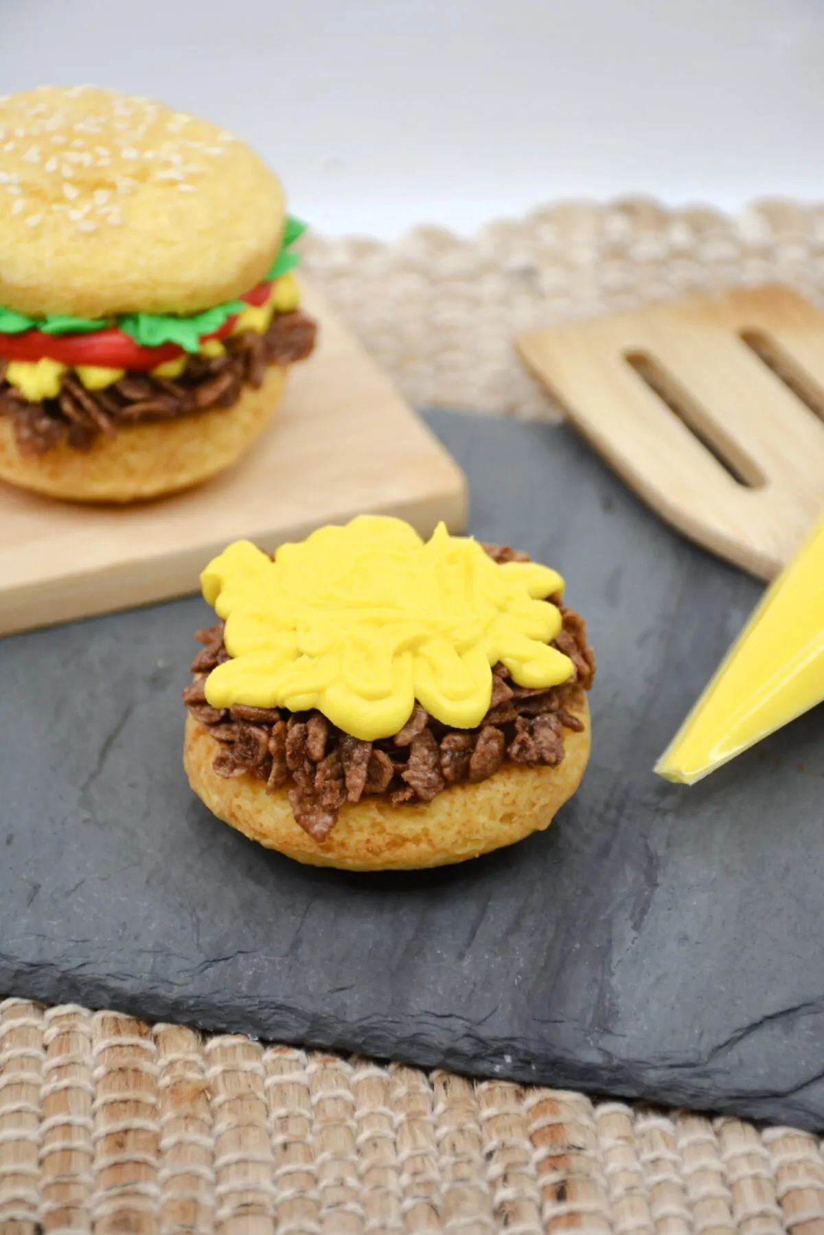 Using yellow frosting to create "mustard".