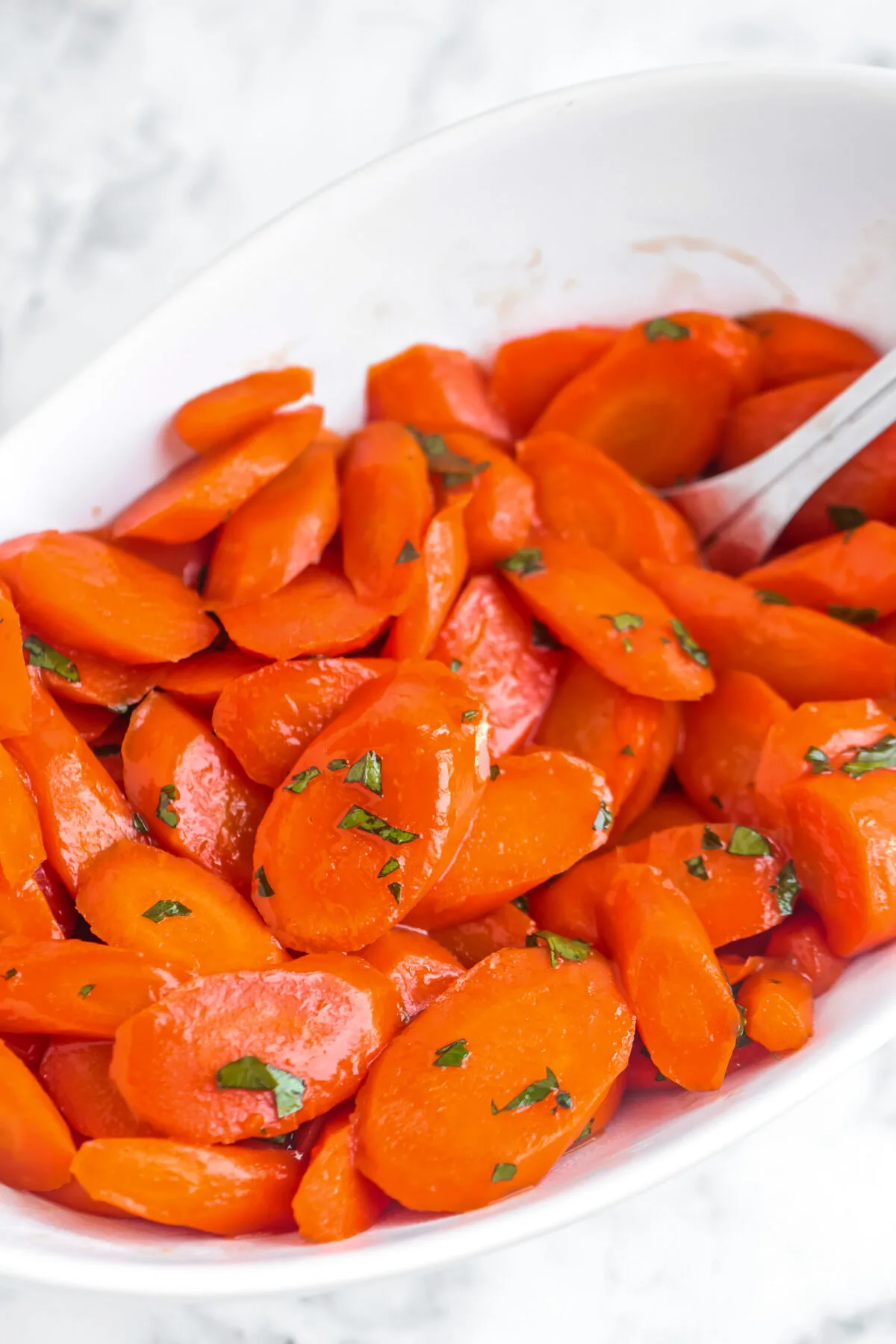 A simple and classic side dish, this easy brown sugar glazed carrots recipe is perfect for holiday dinners or just a tasty weeknight meal.