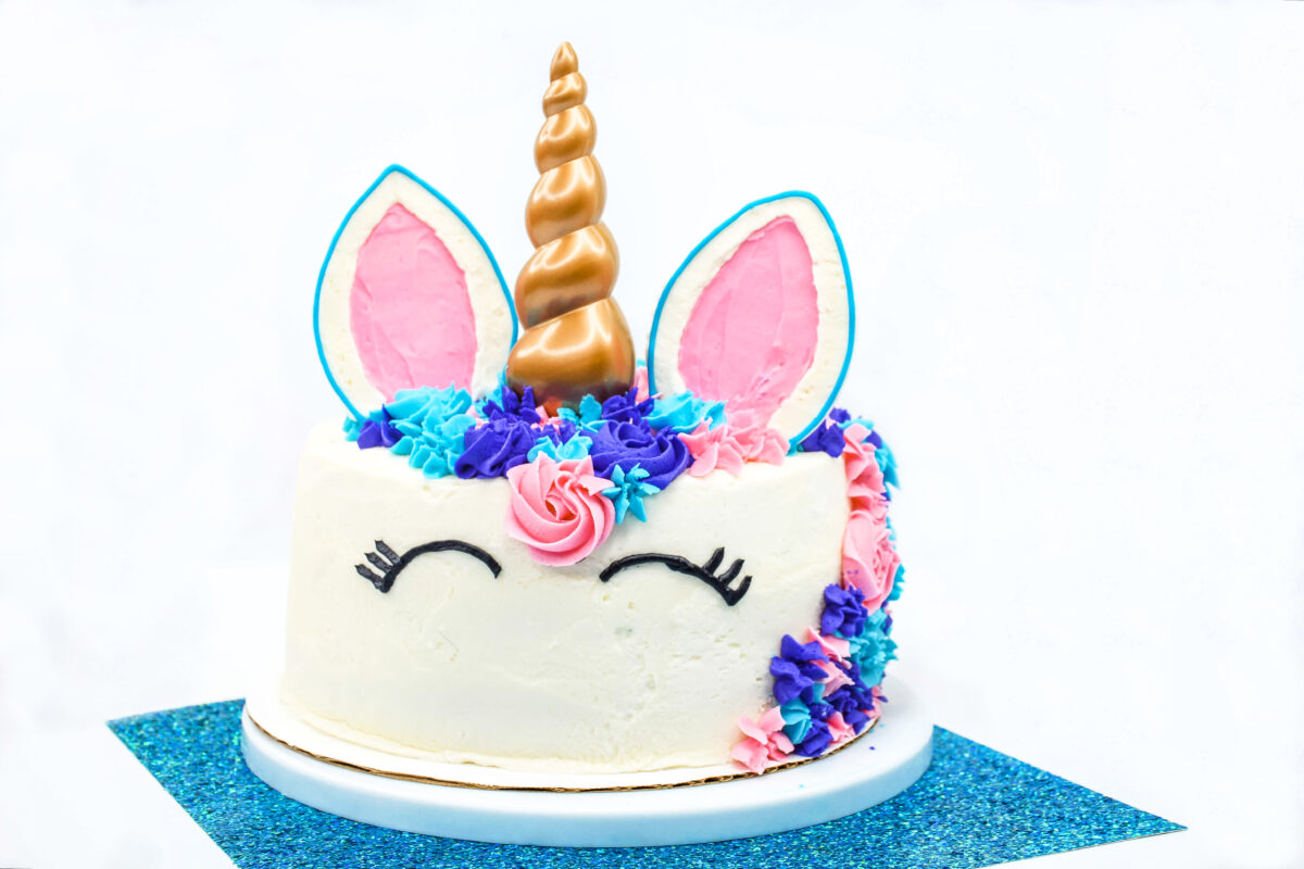 This unicorn cake recipe will make your birthday party the talk of the town. Learn how to make this delicious tie dye cake with three layers!