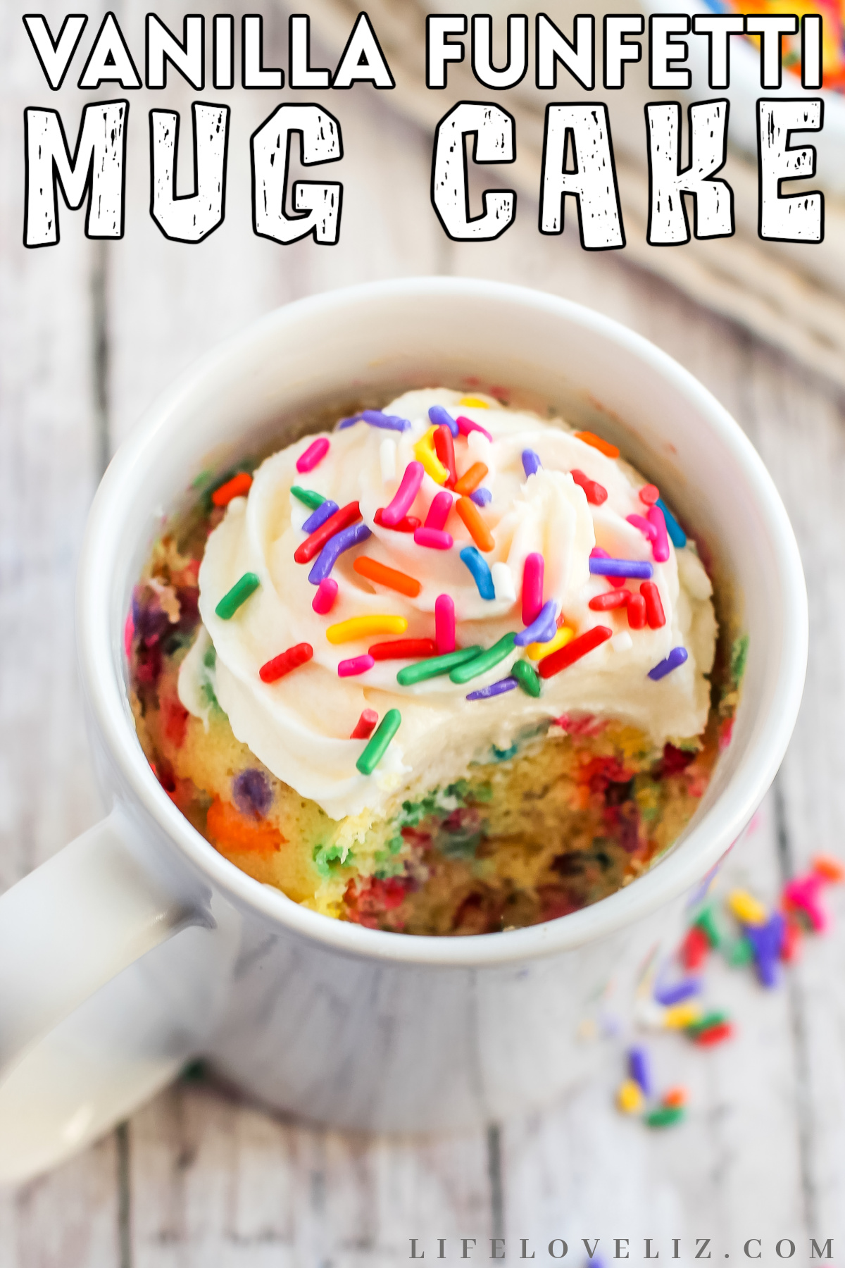 A sweet and simple vanilla funfetti mug cake recipe for the microwave! It's fluffy and moist, and topped with a dollop of buttercream!