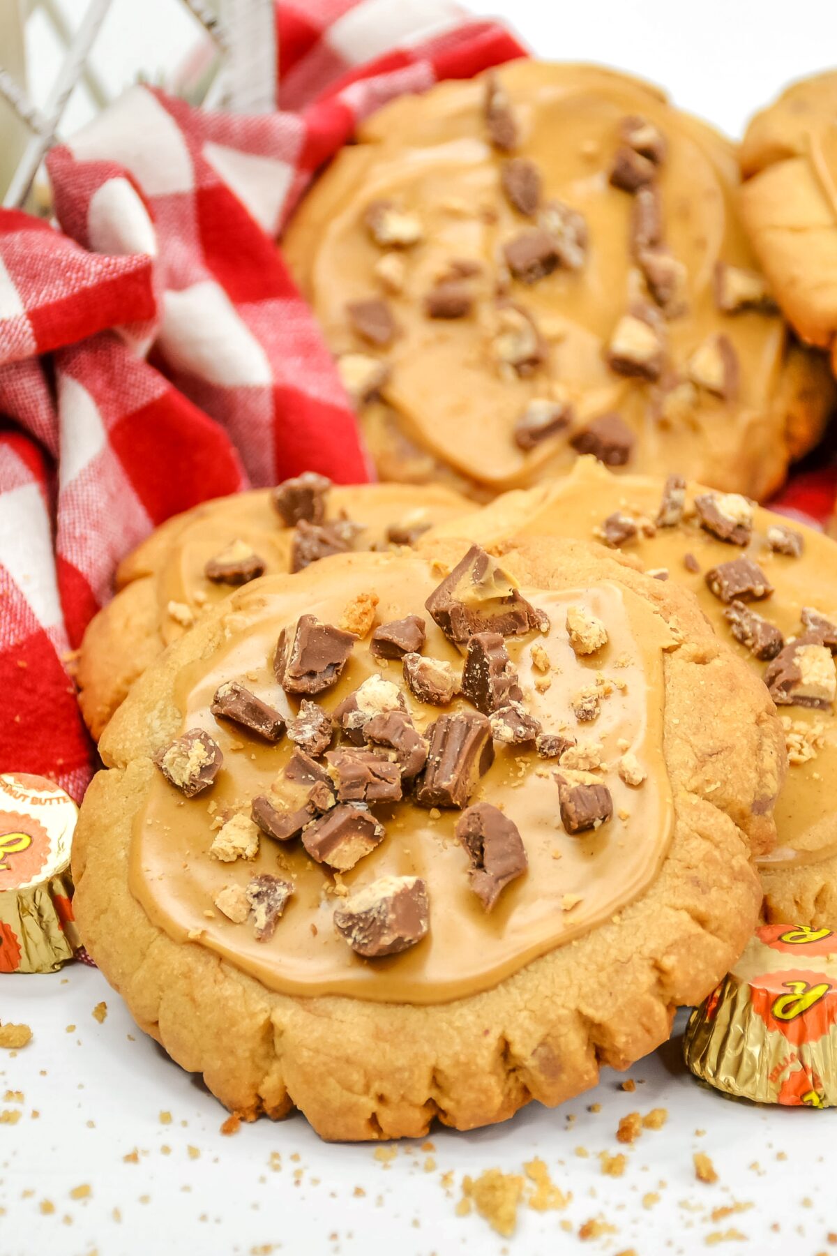 Learn how to make the most delicious peanut butter cookies ever with this copycat recipe for crumbl Reese's peanut butter cup cookies.