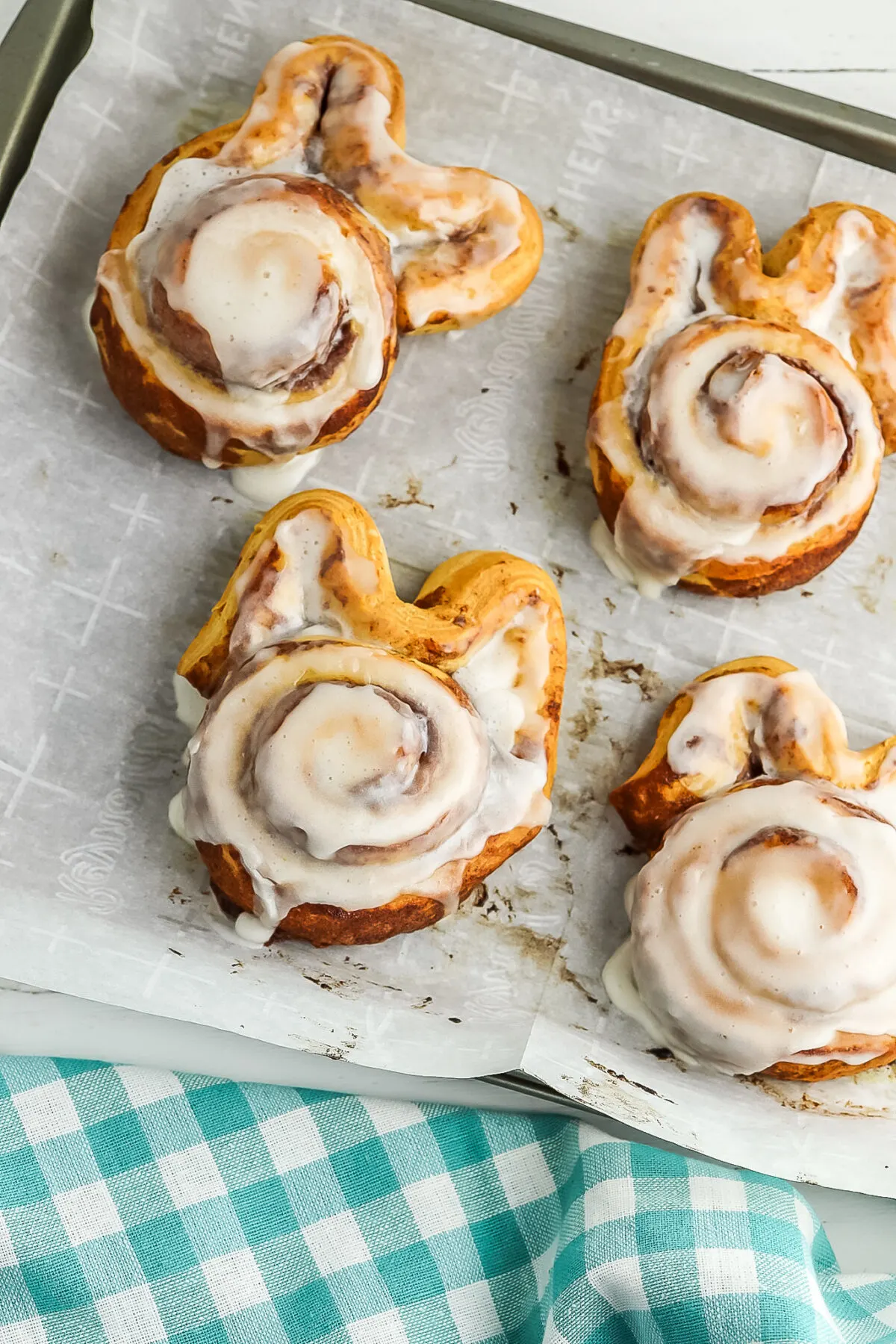 baked and frosted cinnamon roll bunnies.