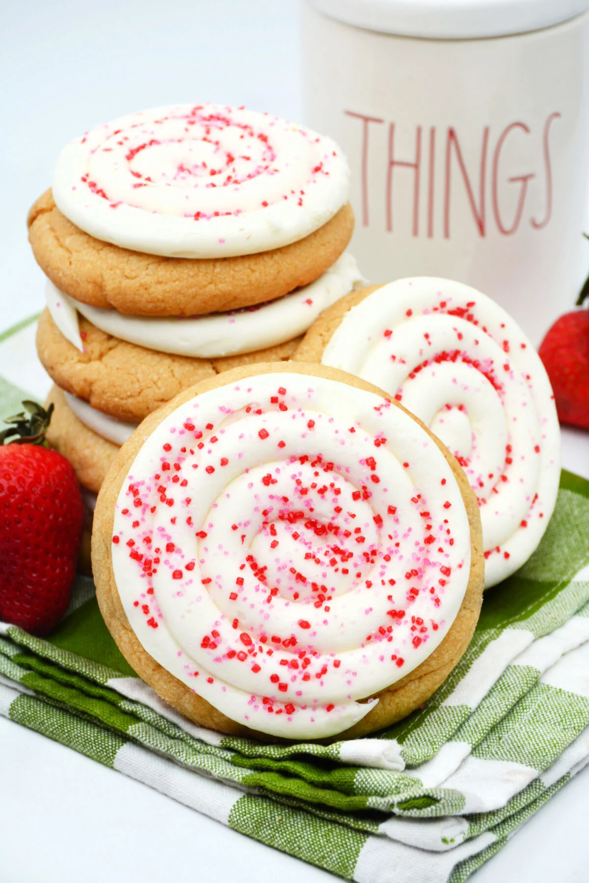 Strawberry pop tart sugar cookies are just like the pop tarts you love, but in strawberry jam filled cookie form complete with frosting!