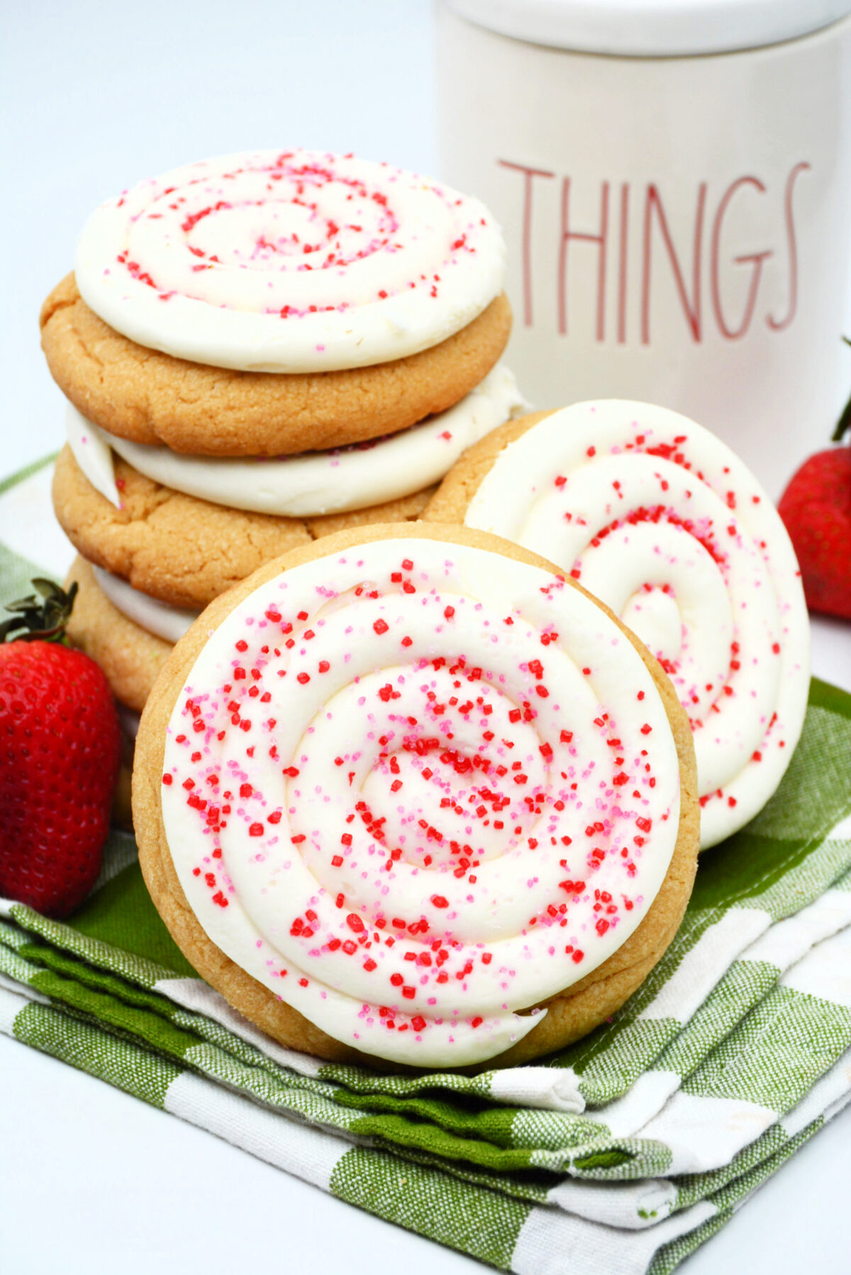 Strawberry pop tart sugar cookies are just like the pop tarts you love, but in strawberry jam filled cookie form complete with frosting!