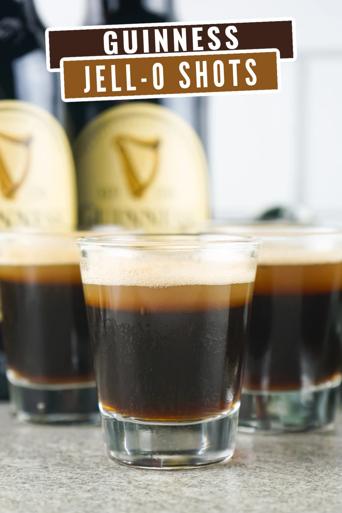 Guinness Jell-O shots are perfect for your next party! Made with stout, Kahlua, and vodka, they look just like mini pint glasses of Guinness.