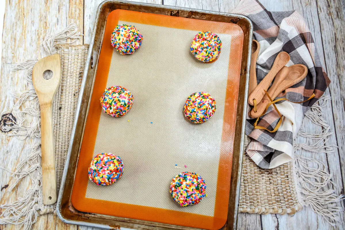 Dough balls rolled in sprinkles.