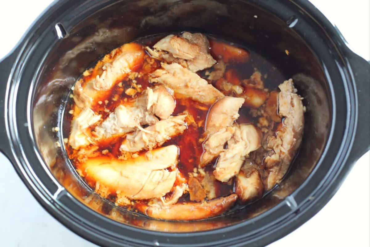Chicken cooked in the slow cooker with the teriyaki sauce.