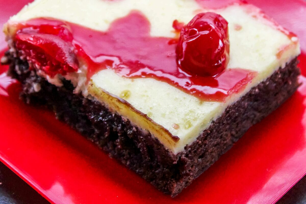 These Cherry Cheesecake Brownies are gooey, fudgy and perfectly sweet. The cheesecake center sends them over the top! Easy to make too.