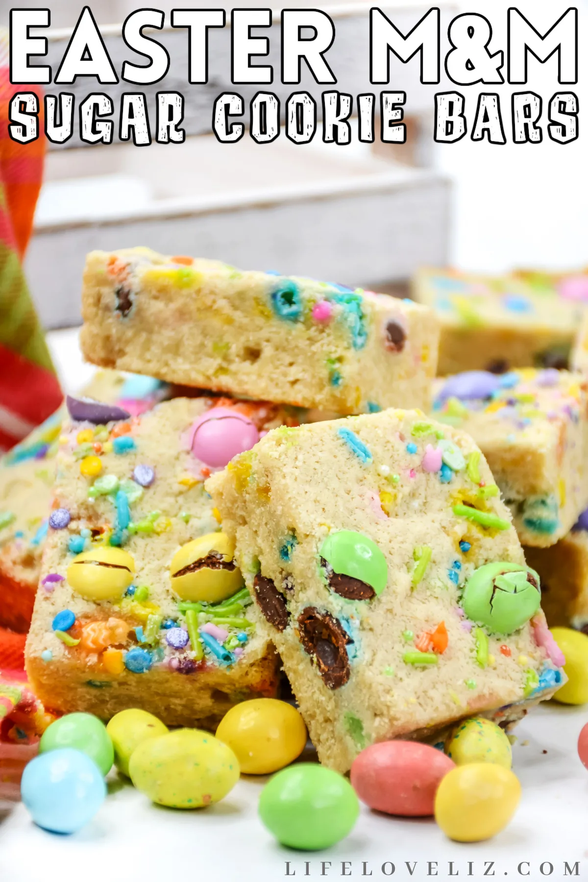 Make this delicious Easter M&M Cookie Bars recipe for a fun and easy spring dessert loaded with Easter m&ms and pastel sprinkles!