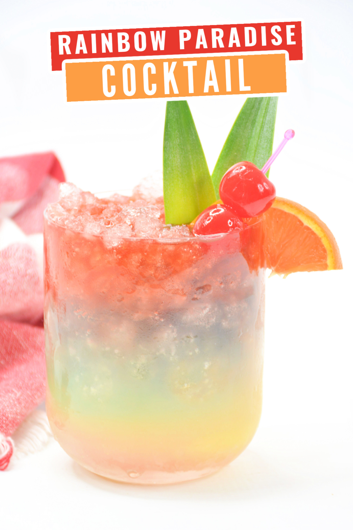 This Rainbow Paradise Cocktail is perfect for a tropical party. It tastes like a tropical vacation and is a rainbow of colourful layers.
