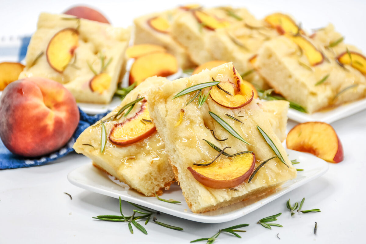 A delicious and easy peach and thyme focaccia bread recipe that will make your taste buds happy! It's a great way to use up ripe peaches.
