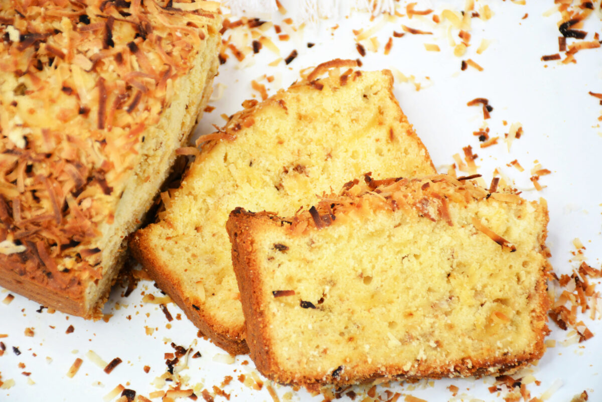 This delicious sweet pineapple coconut bread recipe is perfect for breakfast or dessert! It's loaded with toasted coconut and pineapple.