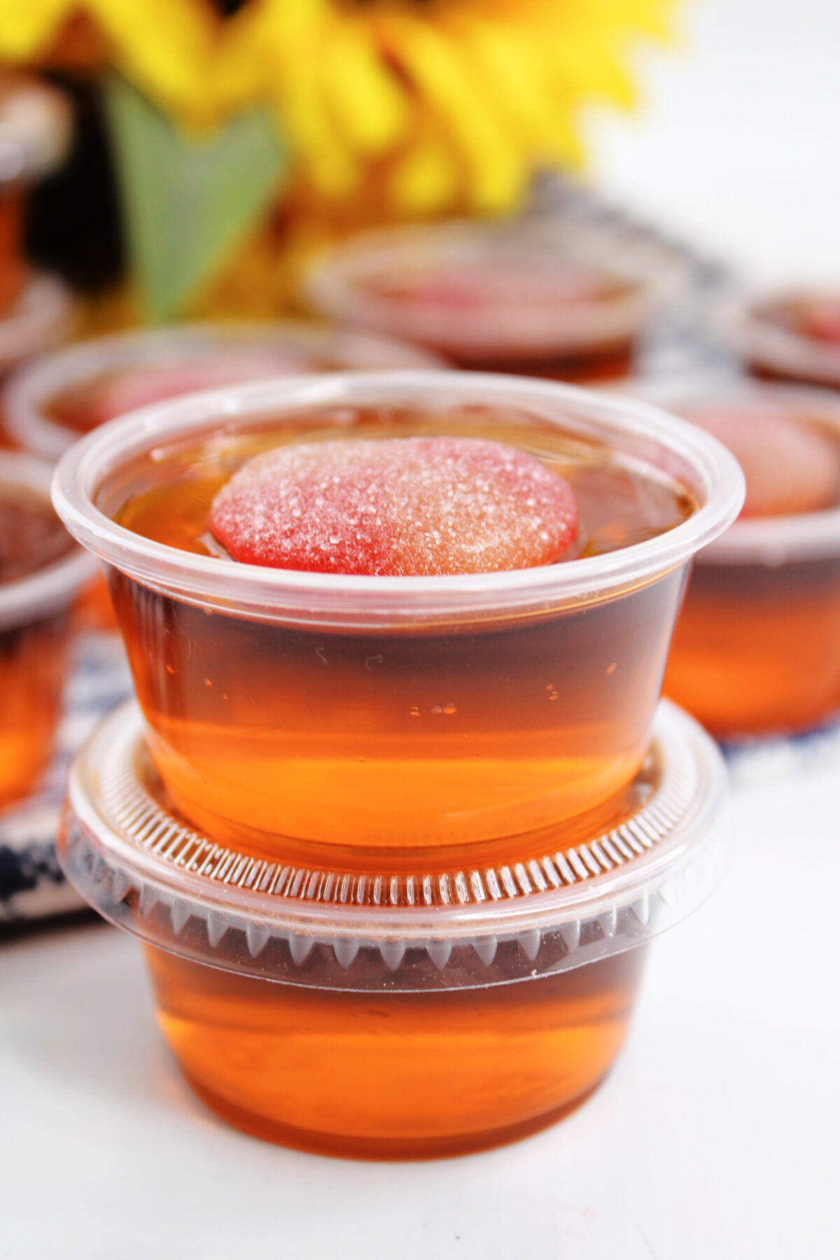 Looking for a fun and easy party recipe? These Crown Peach Jello Shots are perfect for your next get together!