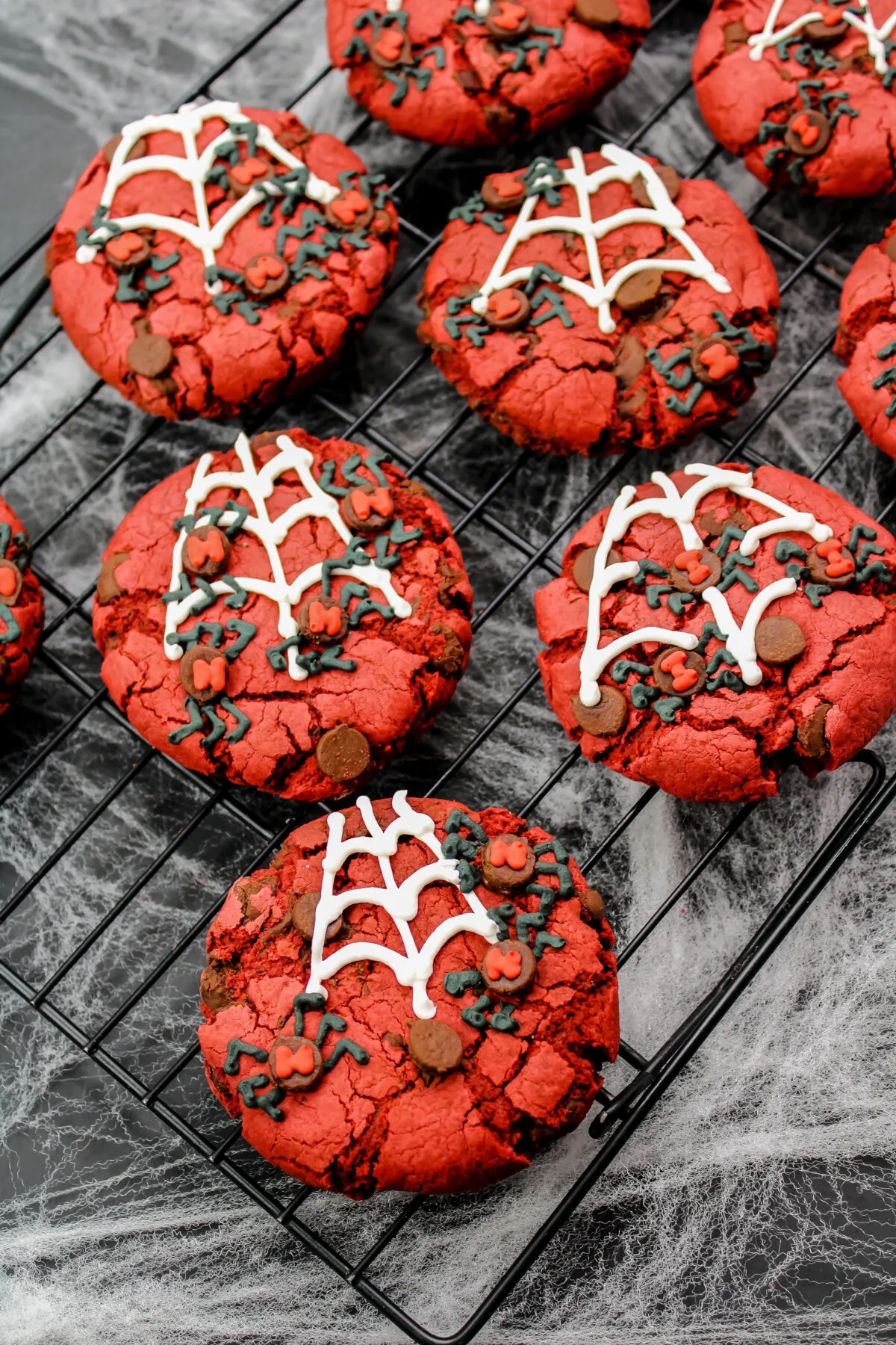 These spooky red velvet Halloween spider cookies are perfect for Halloween! They're easy to make, soft and gooey, and loaded with chocolate!