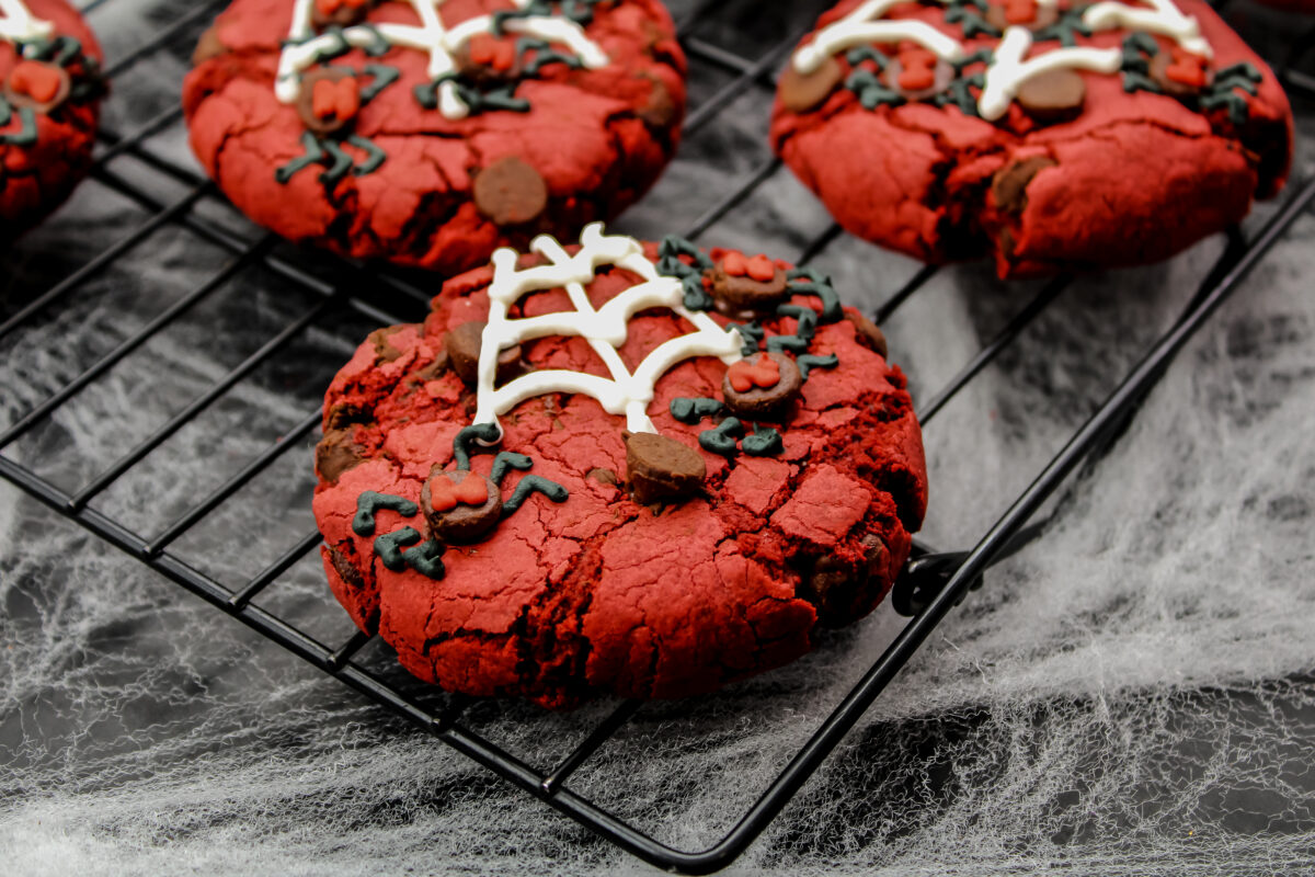 These spooky red velvet Halloween spider cookies are perfect for Halloween! They're easy to make, soft and gooey, and loaded with chocolate!