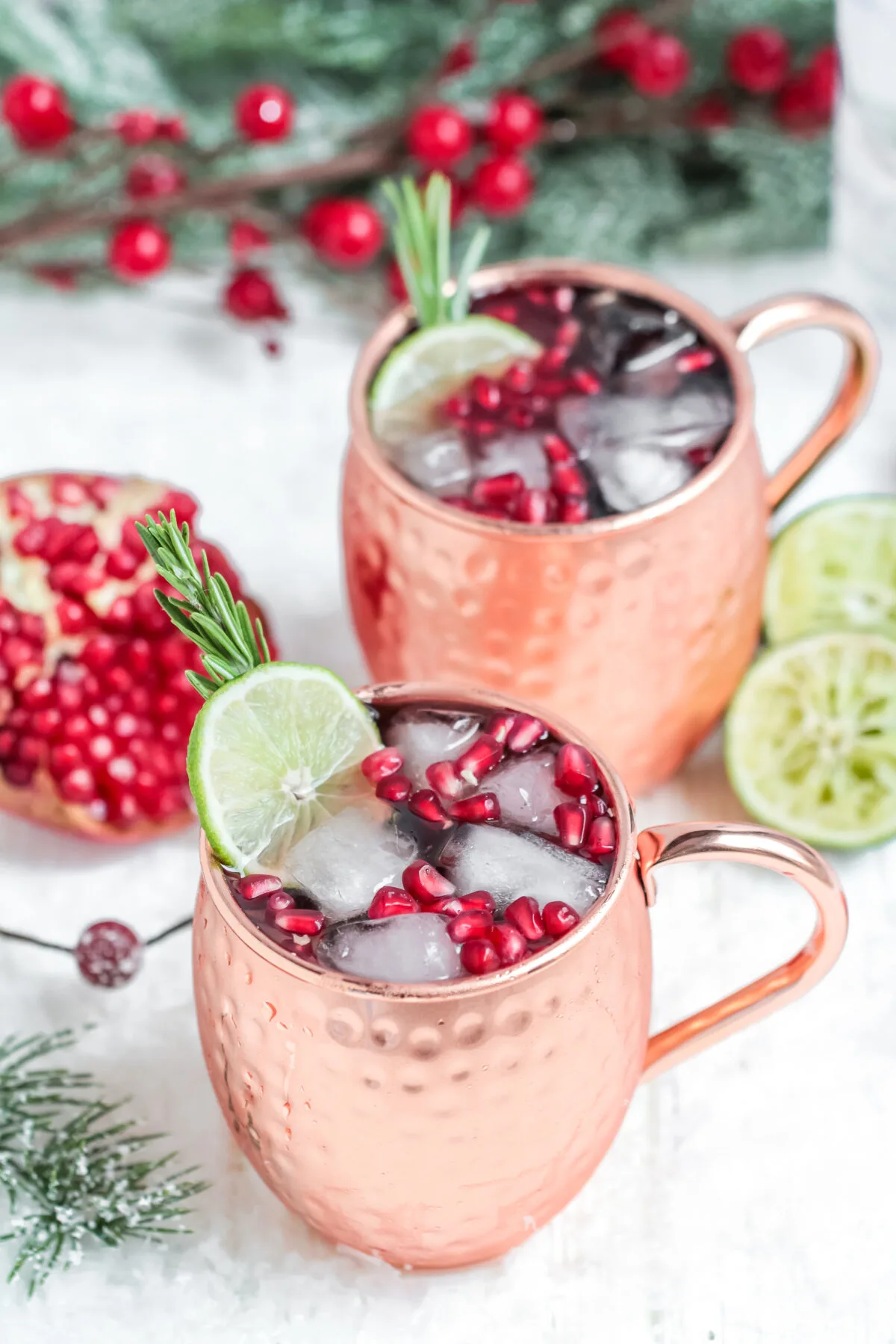 Looking for a festive drink to serve at your Christmas party? This pomegranate Moscow mule recipe is a perfect holiday cocktail!