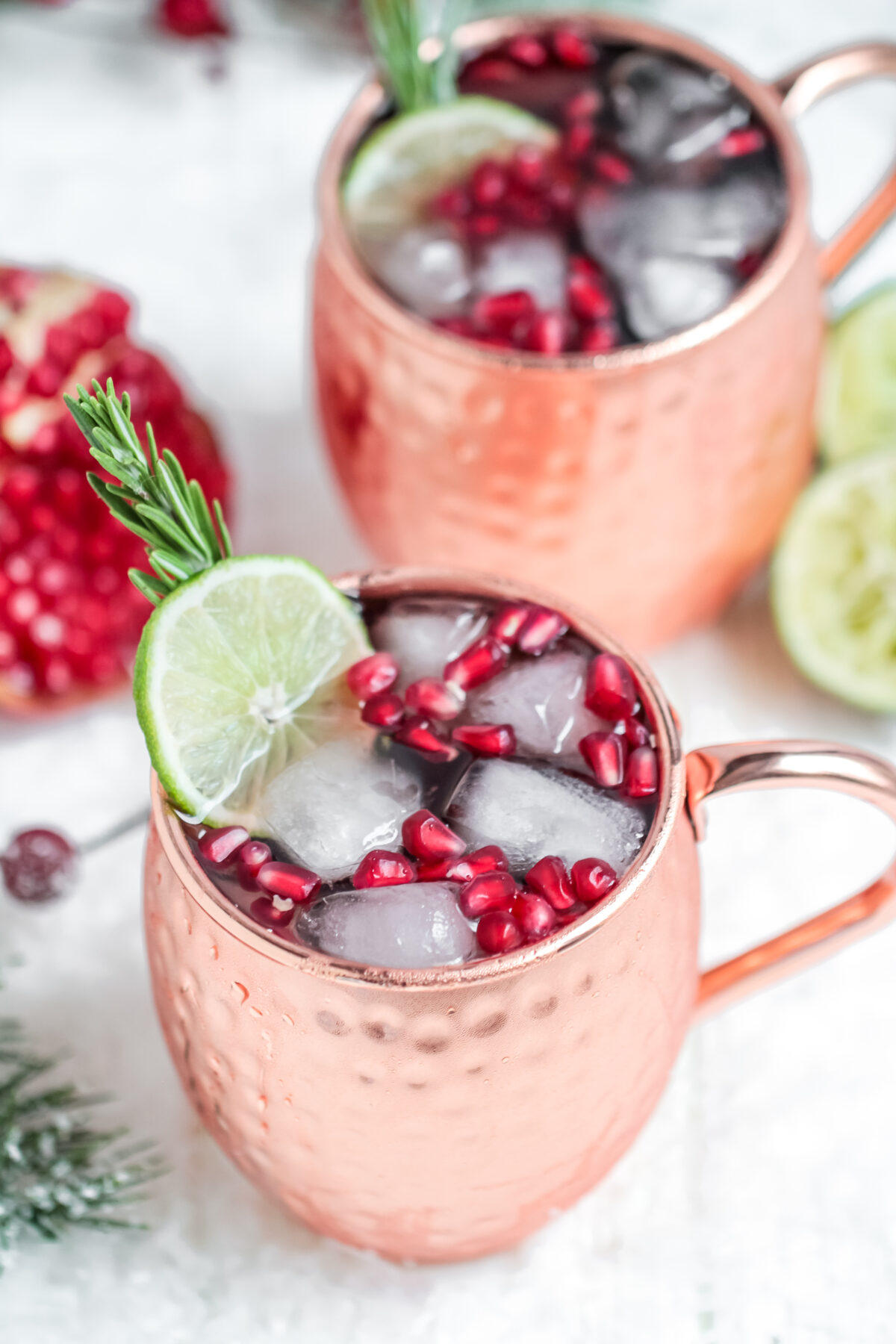 Looking for a festive drink to serve at your Christmas party? This pomegranate Moscow mule recipe is a perfect holiday cocktail!