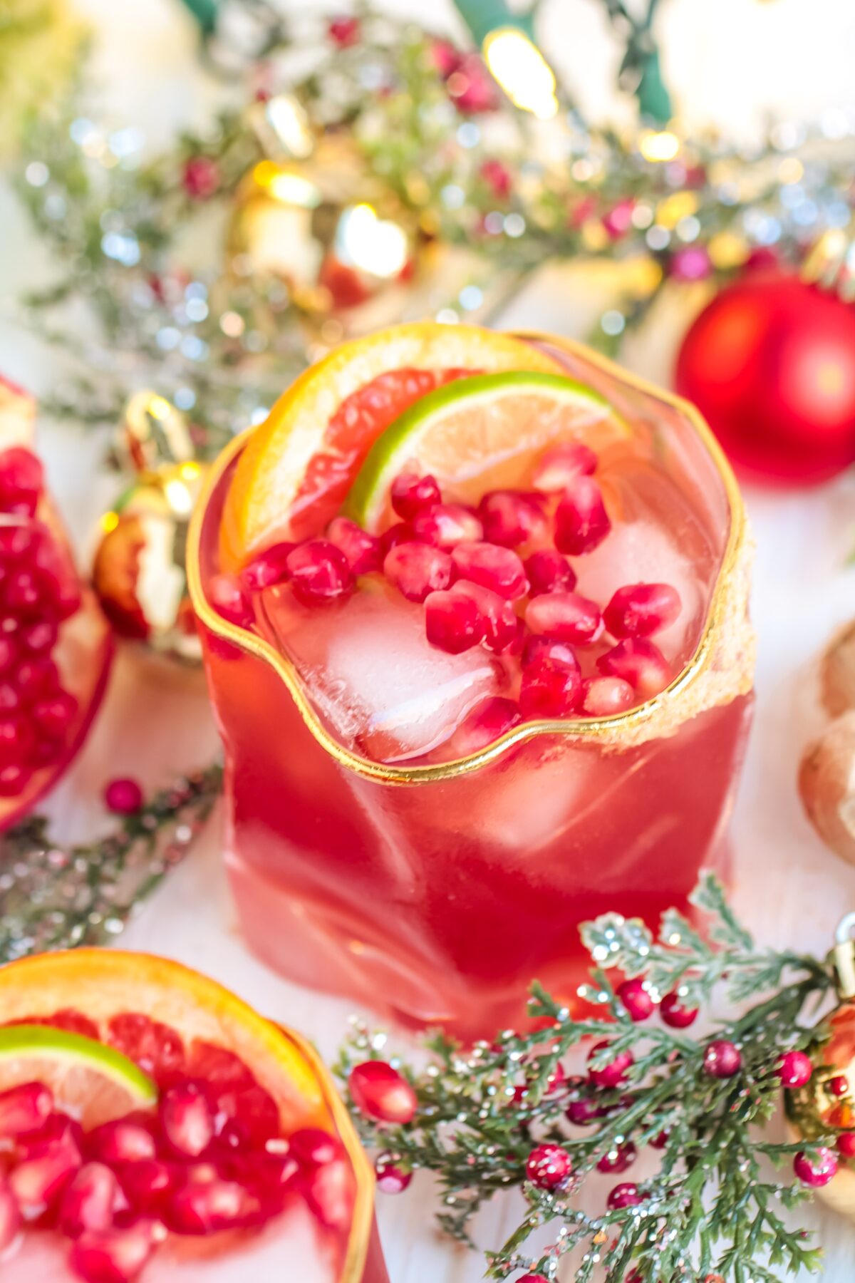 This festive pomegranate ginger paloma recipe is perfect for Christmas parties or gatherings! It's an easy to make ,holiday cocktail.
