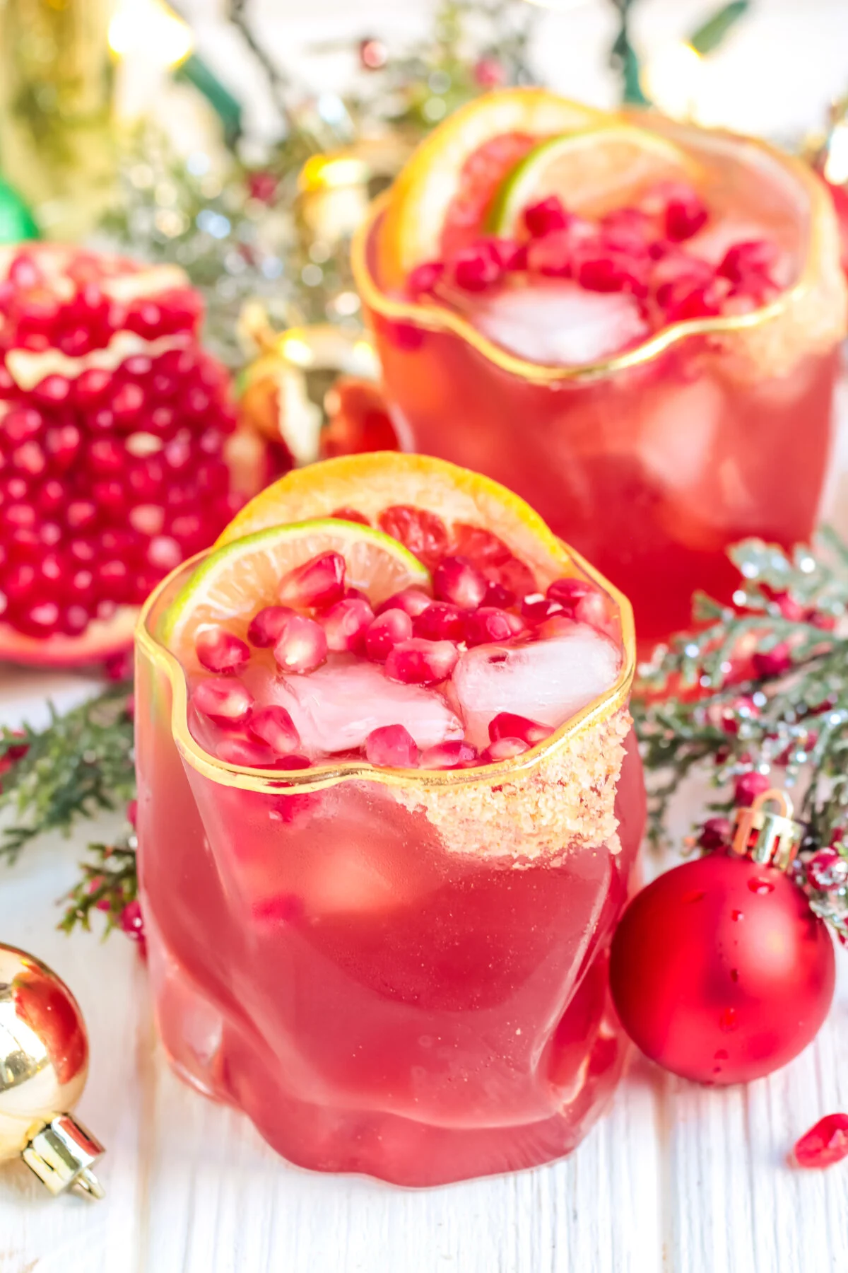This festive pomegranate ginger paloma recipe is perfect for Christmas parties or gatherings! It's an easy to make ,holiday cocktail.